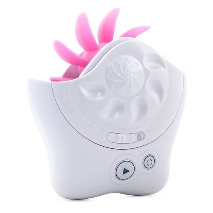 Small white sex toy with rotating wheel of pink plastic tongues