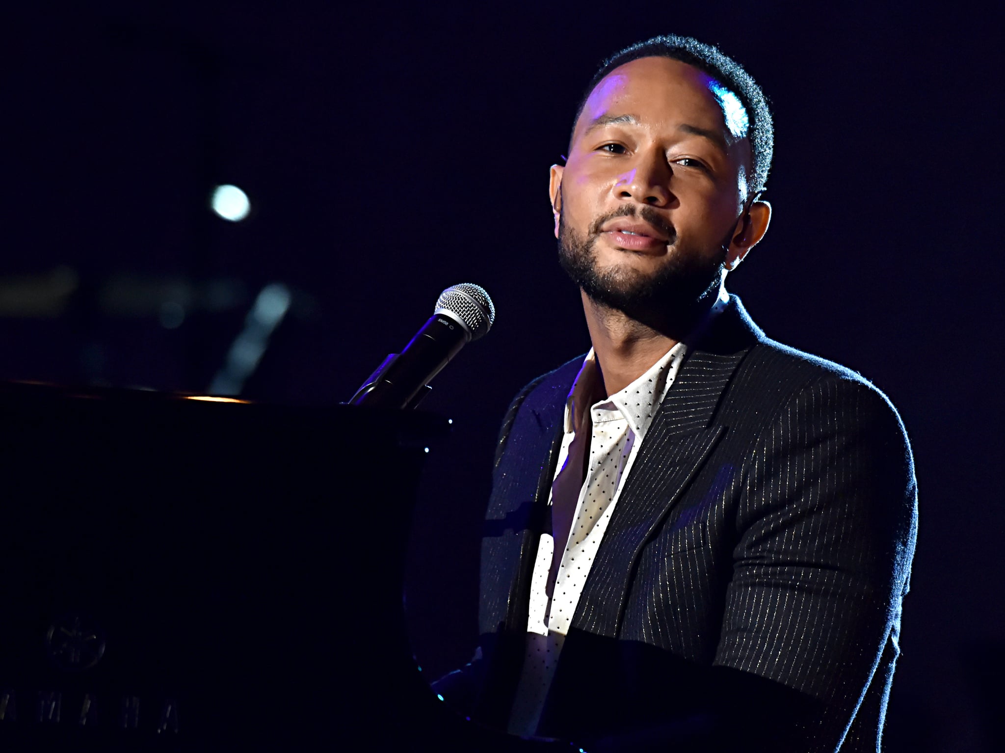 LOS ANGELES, CALIFORNIA - JANUARY 24: John Legend performs onstage during MusiCares Person of the Year honoring Aerosmith at West Hall at Los Angeles Convention Center on January 24, 2020 in Los Angeles, California. (Photo by Lester Cohen/Getty Images for The Recording Academy )