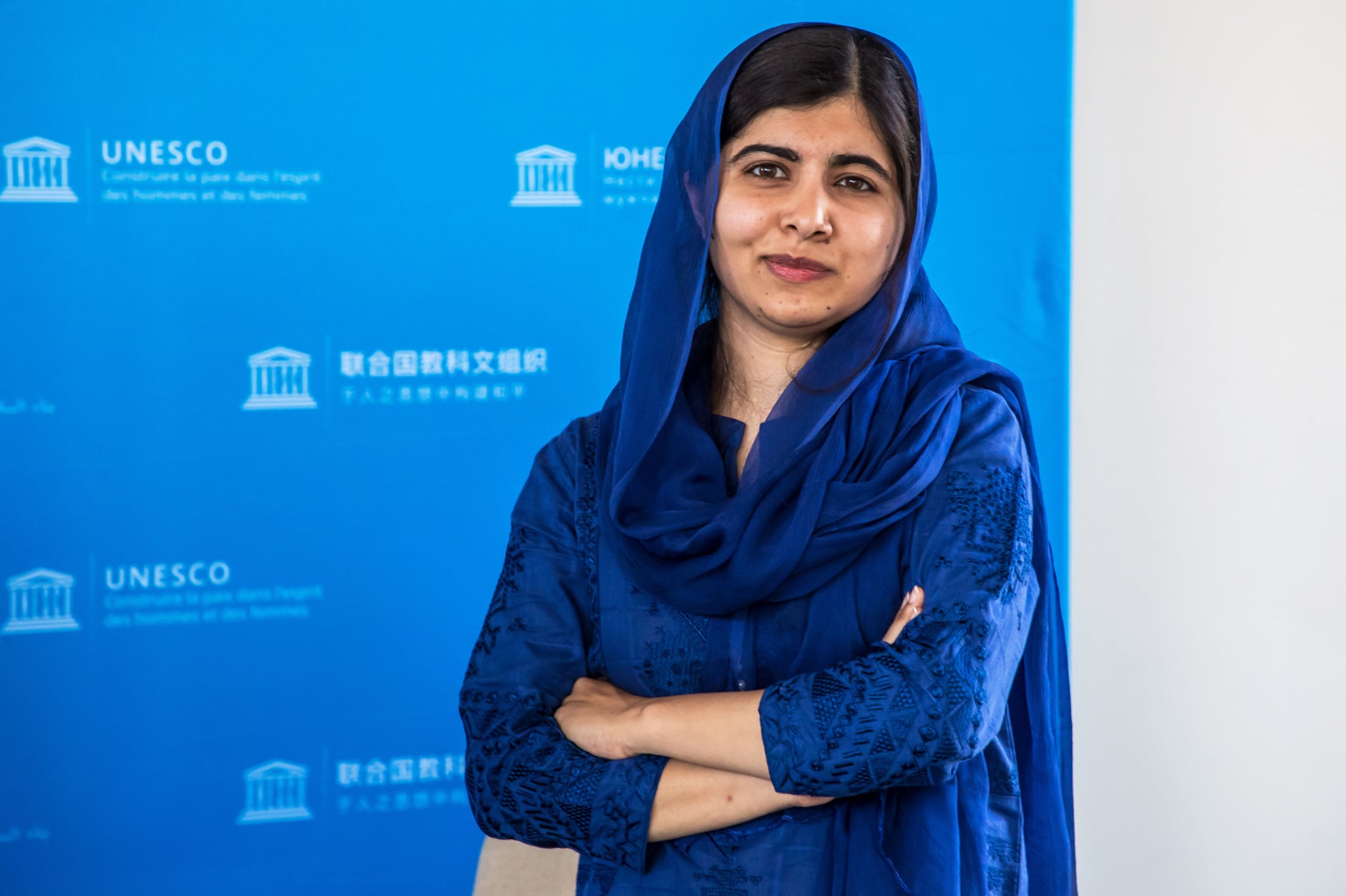 Nobel Peace Prize laureate Malala Yousafzai poses for photo session during the G7 Development and Education Ministers Meeting, in Paris, on July 5, 2019. - France is hosting the rotating presidency of the G7 in 2019. The 45th G7 Summit will be held in August 2019 in Biarritz. (Photo by Christophe PETIT TESSON / POOL / AFP)        (Photo credit should read CHRISTOPHE PETIT TESSON/AFP via Getty Images)