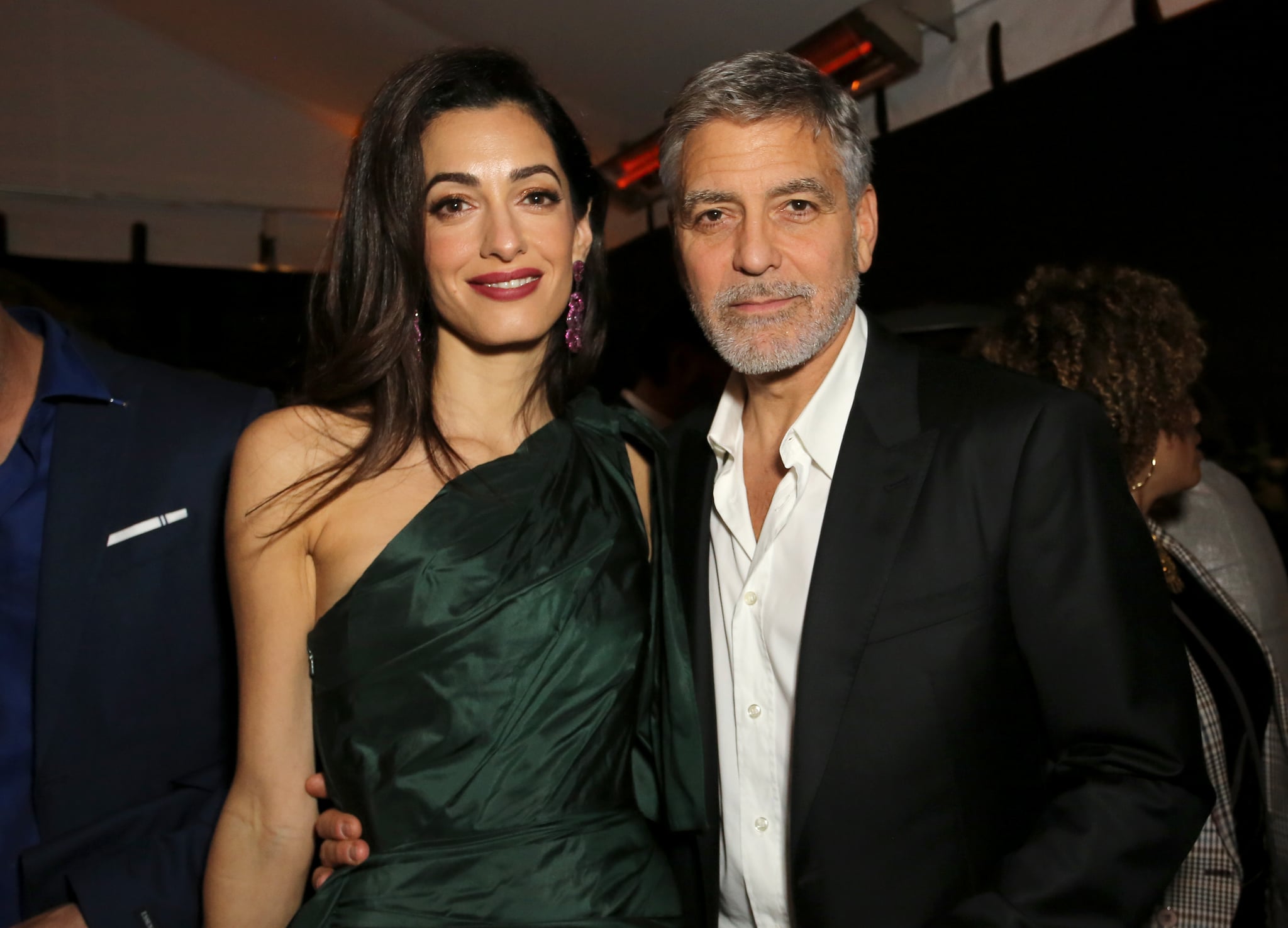 HOLLYWOOD, CALIFORNIA - MAY 07: (L-R) Amal Clooney and George Clooney attends the premiere of Hulu's