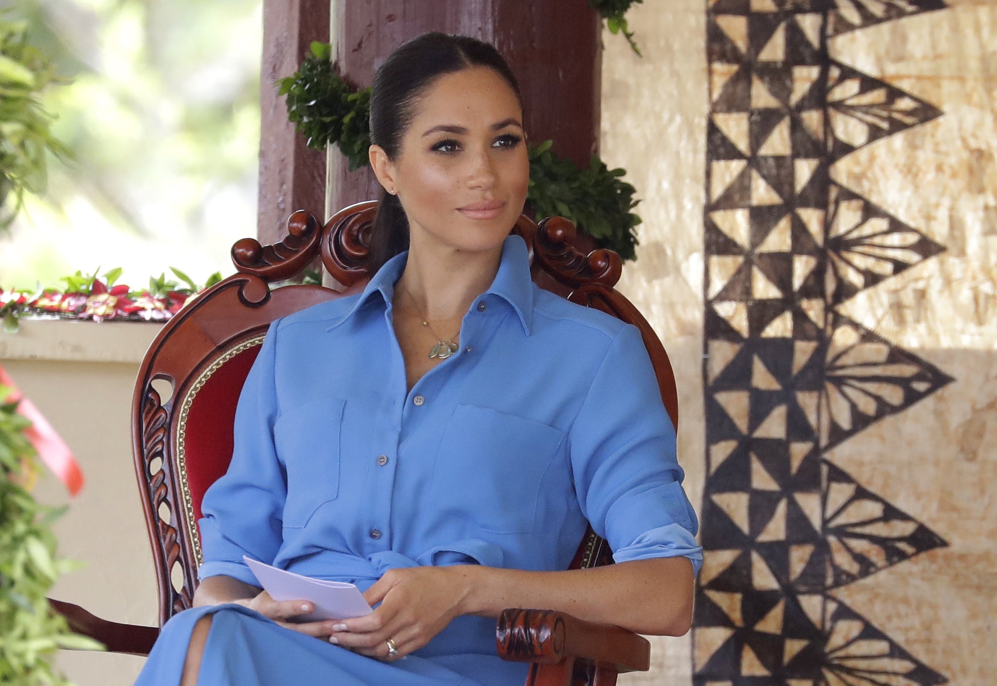 TUPOU COLLEGE TOLOA, TONGA - OCTOBER 26: Meghan, Duchess of Sussex talks with students during a visit to Tupou College in Tonga on October 26, 2018. Prince Harry and his wife Meghan are on day 11 of their 16-day tour of Australia and the South Pacific. (Photo by Kirsty Wigglesworth - Pool/Getty Images)