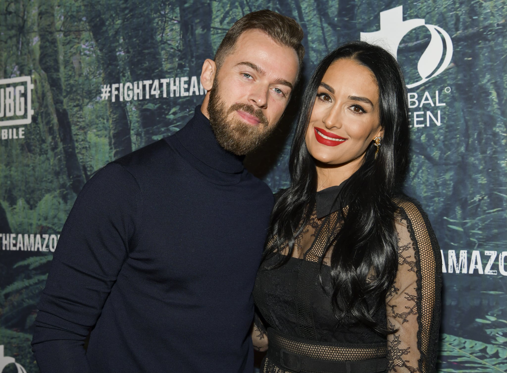 LOS ANGELES, CALIFORNIA - DECEMBER 09: Artem Chigvintsev (L) and Nikki Bella attend the PUBG Mobile's #FIGHT4THEAMAZON Event at Avalon Hollywood on December 09, 2019 in Los Angeles, California. (Photo by Rodin Eckenroth/Getty Images)