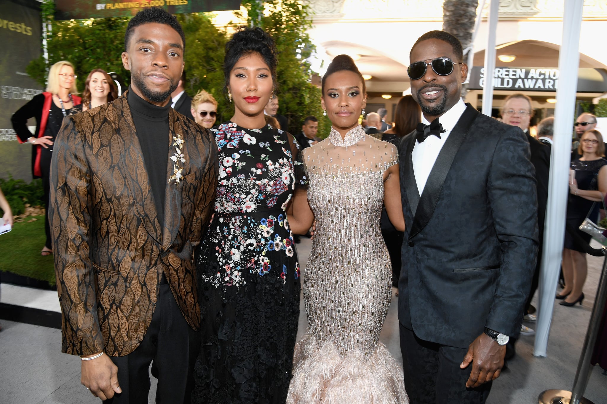 LOS ANGELES, CA - JANUARY 27:  (L-R) Chadwick Boseman, Taylor Simone Ledward, Ryan Michelle Bathe, and Sterling K. Brown attend the 25th Annual Screen Actors Guild Awards at The Shrine Auditorium on January 27, 2019 in Los Angeles, California. 480568  (Photo by Kevin Mazur/Getty Images for Turner)