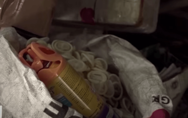 Vietnam Police Raid Warehouse Found Re-cycling Condoms!!