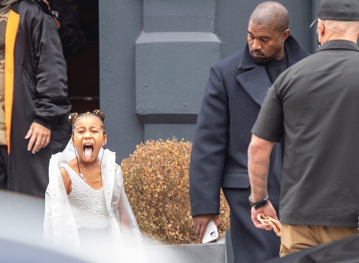 North West Sticks It to Photogs With Her Tongue in the U.K. with Kanye West