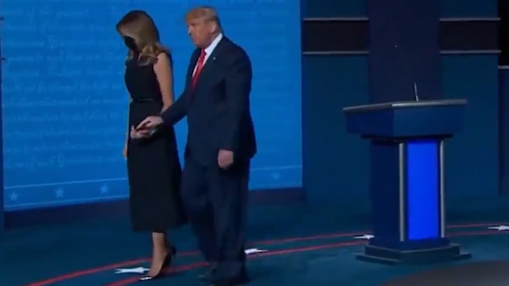 Melania Appears to Pull Hand Away from President Trump After Debate