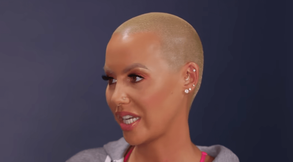 Amber Rose Claims 'Famous' Ex Boyfriend Raped Her - Fans Think Kanye!!