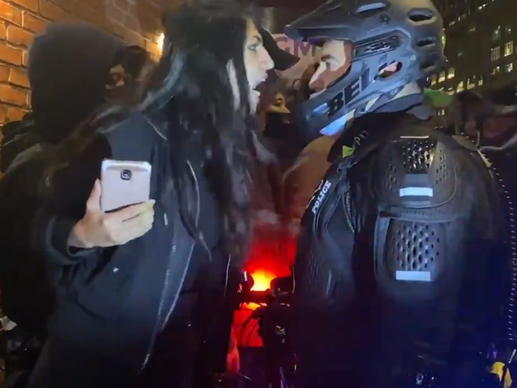 Woman Arrested for Spitting in Cop's Face Amid NYC Unrest, Riot in Portland
