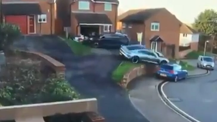 Porsche Smacks SUV, Careens Off Wall and Lands On Top of Car