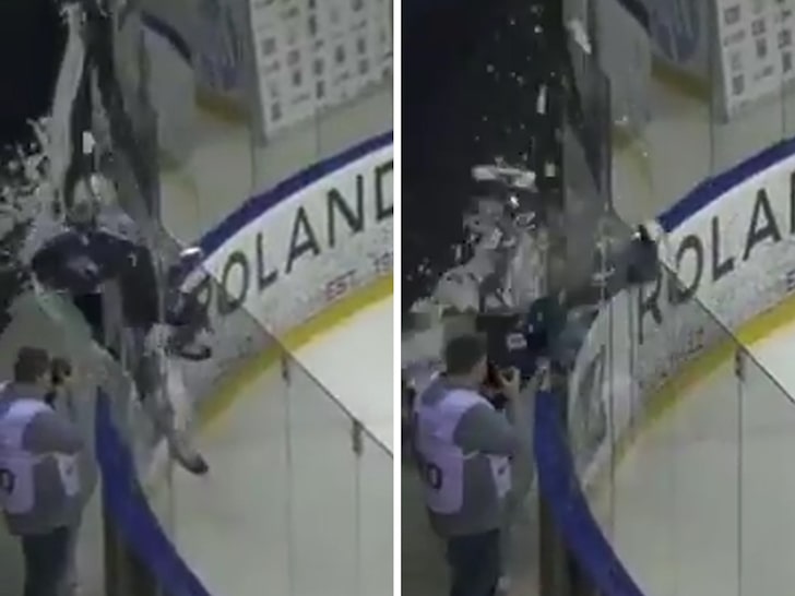 Hockey Player Smashes Through Glass During Goal Celebration, Whoops!