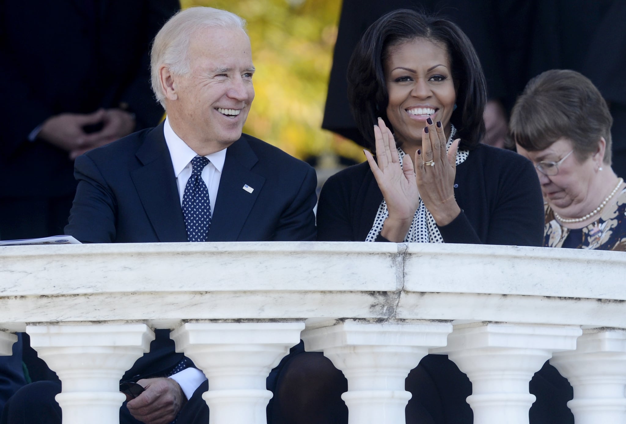 ARLINGTON, VA - NOVEMBER 11: US Vice President Joe Biden (L) and First Lady Michelle Obama (R) attend a ceremony on Veteran's Day at the Tomb of the Unknown Soldier in Arlington National Cemetery on November 11, 2012 in Arlington, Virginia. (Photo by Michael Reynolds-Pool/Getty Images)