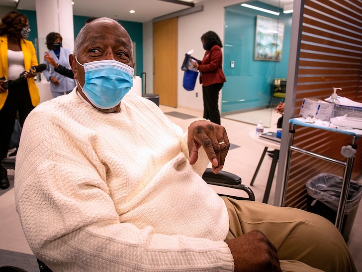 Hank Aaron Gets COVID Vaccine, Hopes to Inspire Black Americans to Follow Suit