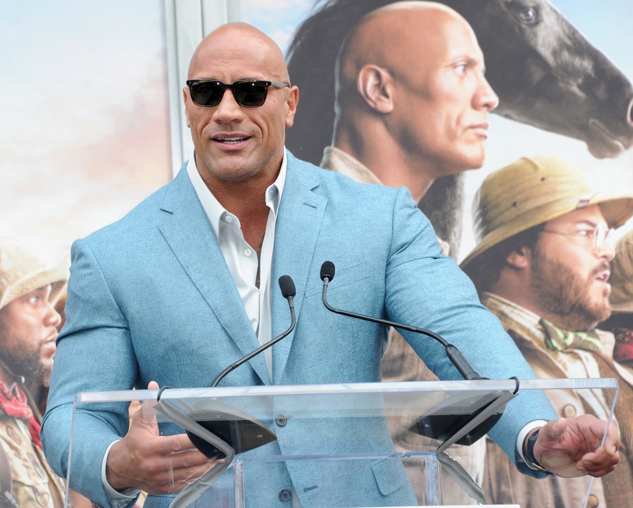 HOLLYWOOD, CA - DECEMBER 10:  Dwayne Johnson speaks at  Kevin Hart's Hand And Footprint Ceremony At the TCL Chinese Theatre IMAX held at TCL Chinese Theatre on December 10, 2019 in Hollywood, California.  (Photo by Albert L. Ortega/Getty Images)