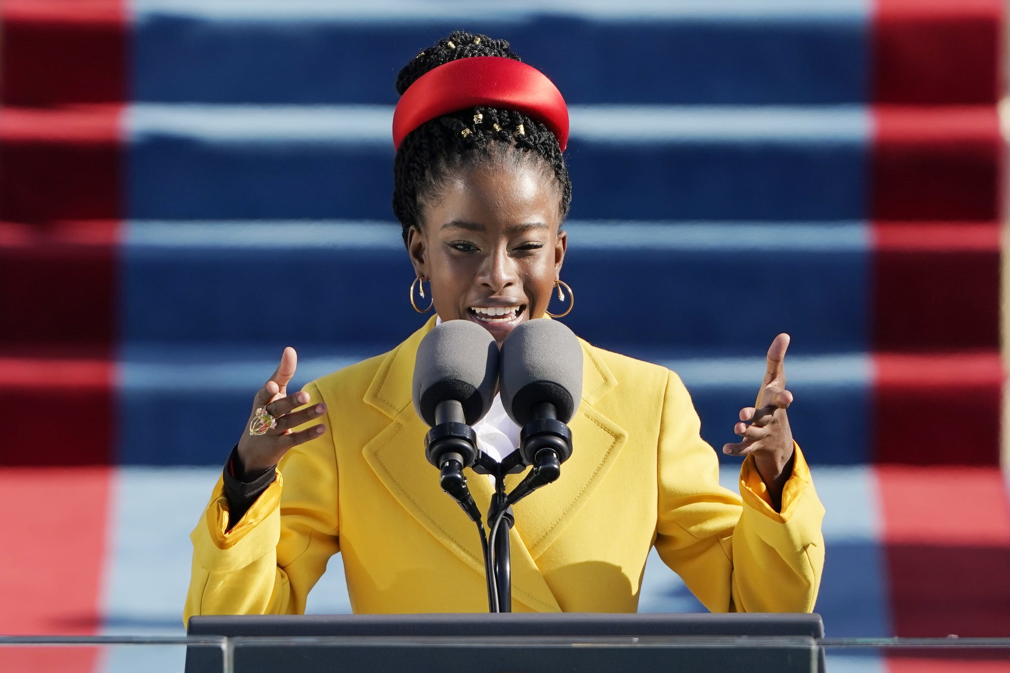 WASHINGTON, DC - JANUARY 20: American poet Amanda Gorman reads a poem during the the 59th inaugural ceremony on the West Front of the U.S. Capitol on January 20, 2021 in Washington, DC.  During today's inauguration ceremony Joe Biden becomes the 46th president of the United States. (Photo by Patrick Semansky-Pool/Getty Images)