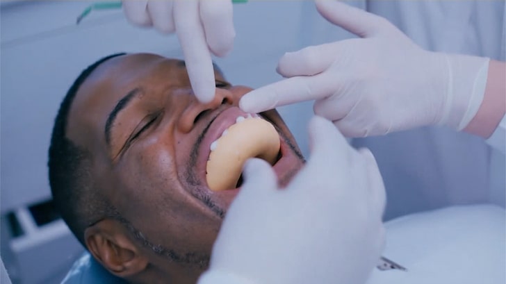 Michael Strahan's Driving Huge Business to Dentist Who 'Fixed' Gap Tooth