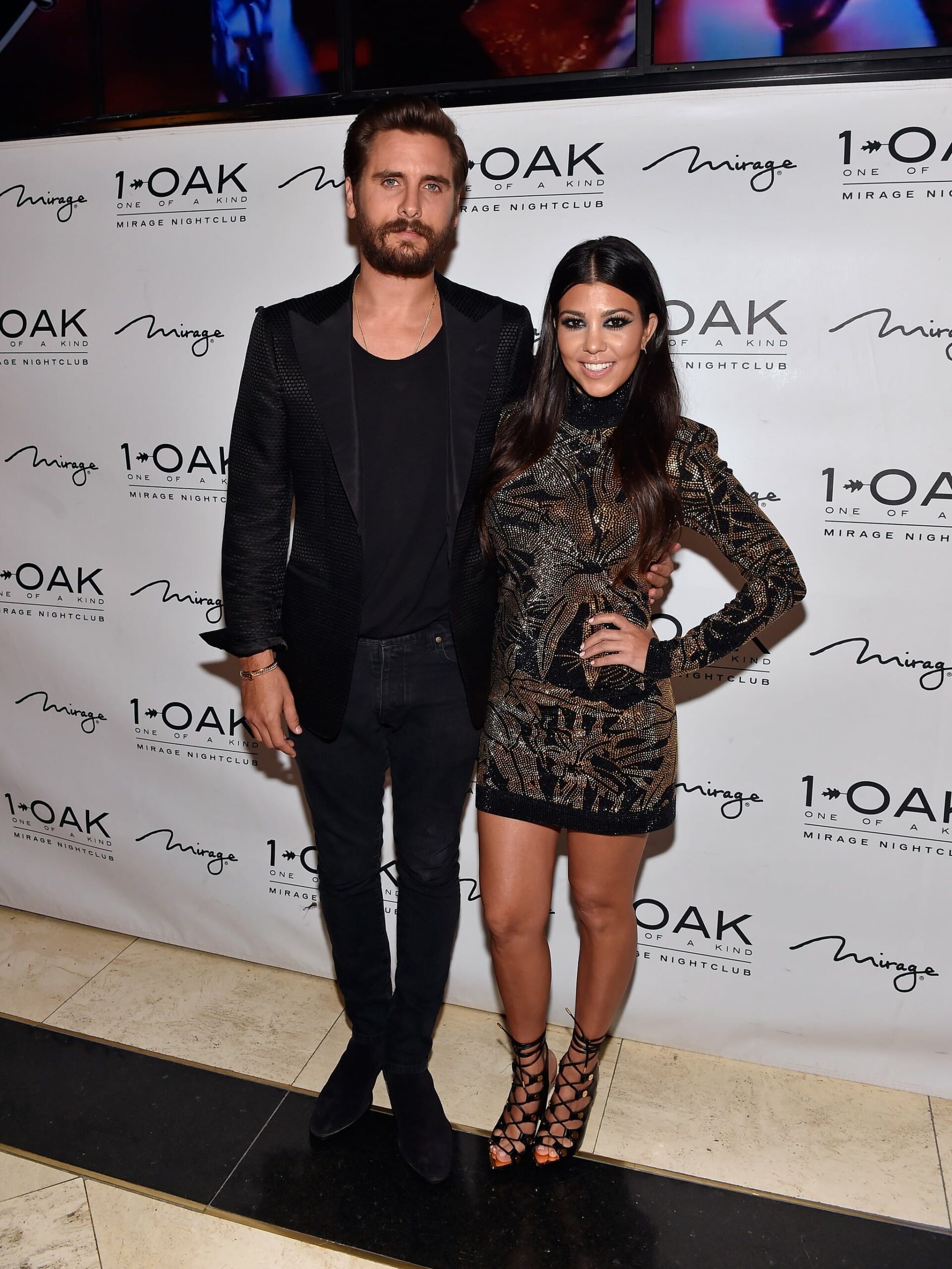 LAS VEGAS, NV - MAY 23:  Television personalities Scott Disick (L) and Kourtney Kardashian arrive at his birthday celebration at 1 OAK Nightclub at The Mirage Hotel & Casino on May 23, 2015 in Las Vegas, Nevada.  (Photo by David Becker/WireImage)