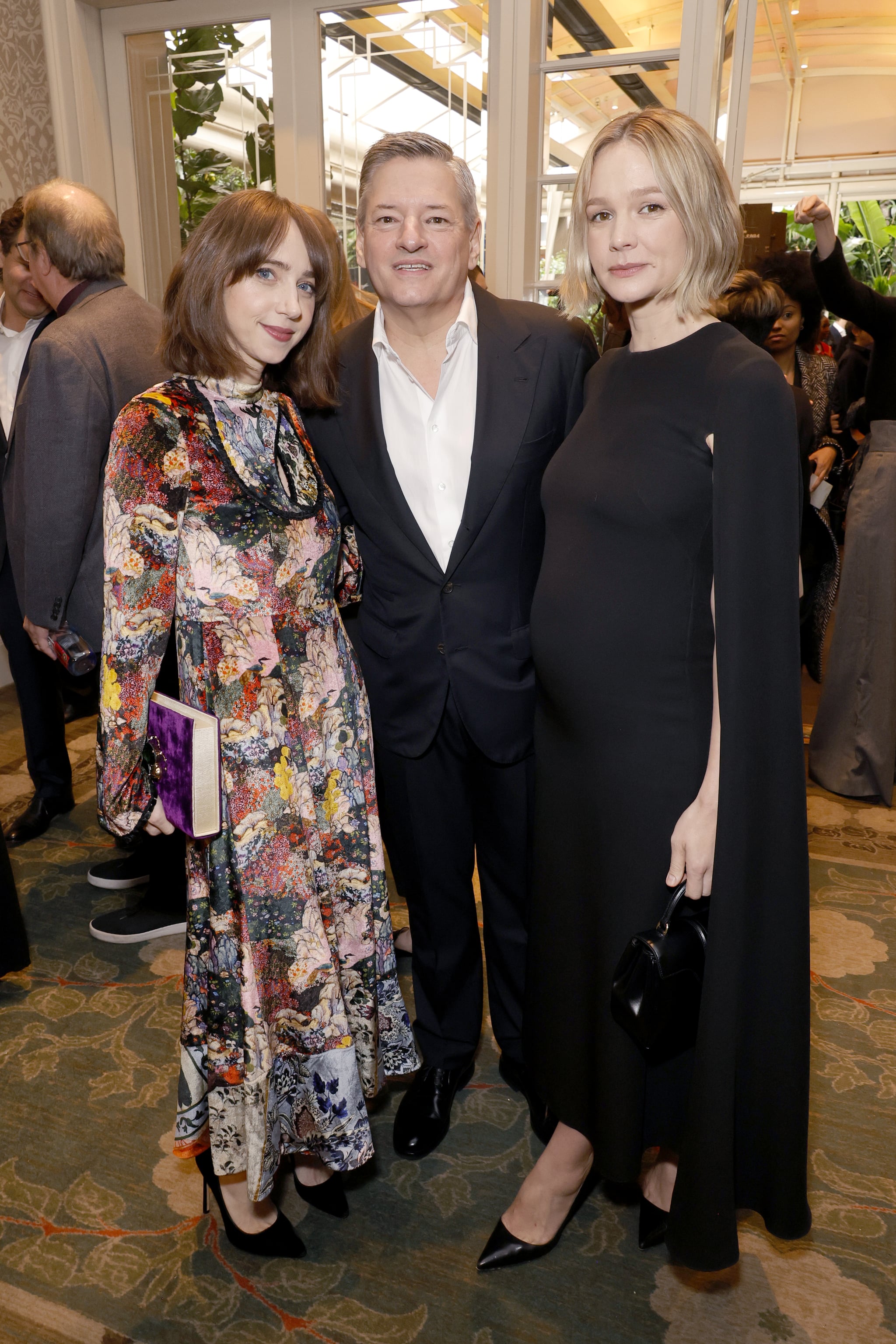 LOS ANGELES, CALIFORNIA - JANUARY 13: (L-R) Zoe Kazan, Netflix Co-CEO and Chief Content Officer Ted Sarandos and Carey Mulligan attend the AFI Awards Luncheon at Four Seasons Hotel Los Angeles at Beverly Hills on January 13, 2023 in Los Angeles, California. (Photo by Frazer Harrison/Getty Images)