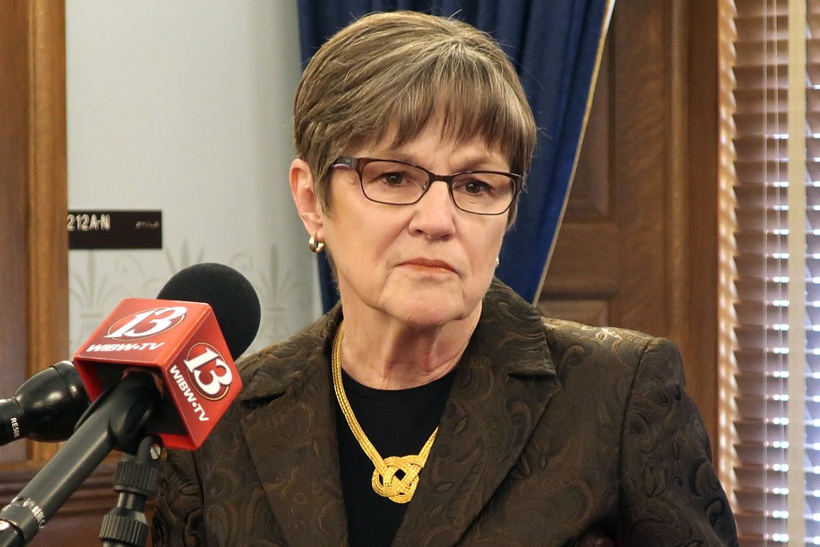 FILE - In this Feb 14, 2019 file photo, Kansas Gov. Laura Kelly ponders a question during a news conference at the Statehouse in Topeka, Kan. Kelly is meeting unexpected resistance to her plan for boosting public education funding. It