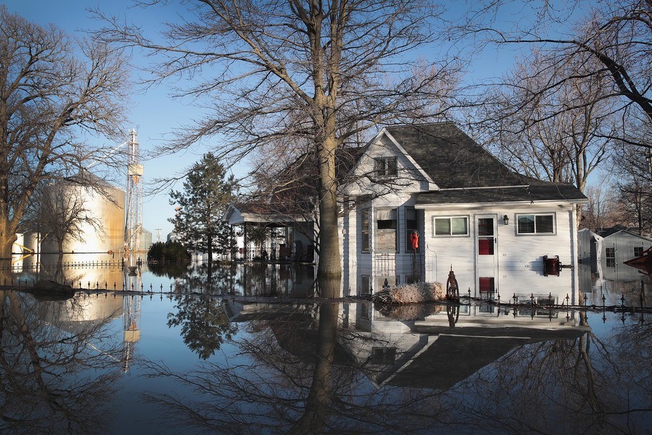 CRAIG, MISSOURI - MARCH 21:  A home is surrounded by floodwater on March 21, 2019 in Craig, Missouri. The town of Craig is completely surrounded by floodwater, every building water damaged. Several Midwest states are battling some of the worst flooding they have experienced in decades as rain and snow melt from the recent