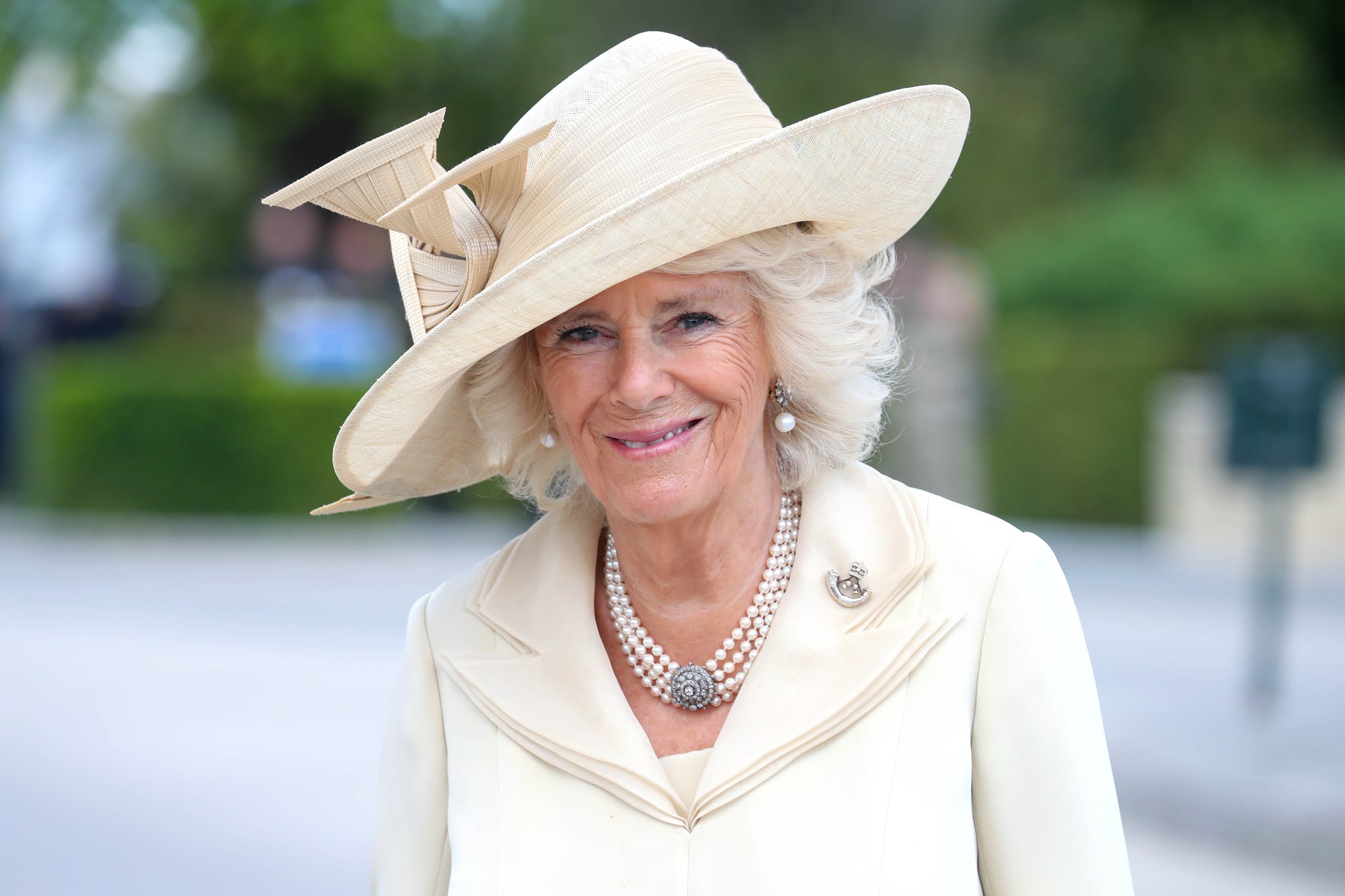 BAYEUX, FRANCE - JUNE 06: Camilla, Duchess of Cornwall arrives at Bayeux War Cemetery on June 06, 2019 in Bayeux, France. Veterans, families, visitors, political leaders and military personnel are gathering in Normandy to commemorate D-Day, which heralded the Allied advance towards Germany and victory about 11 months later.  (Photo by Chris Jackson/Getty Images)