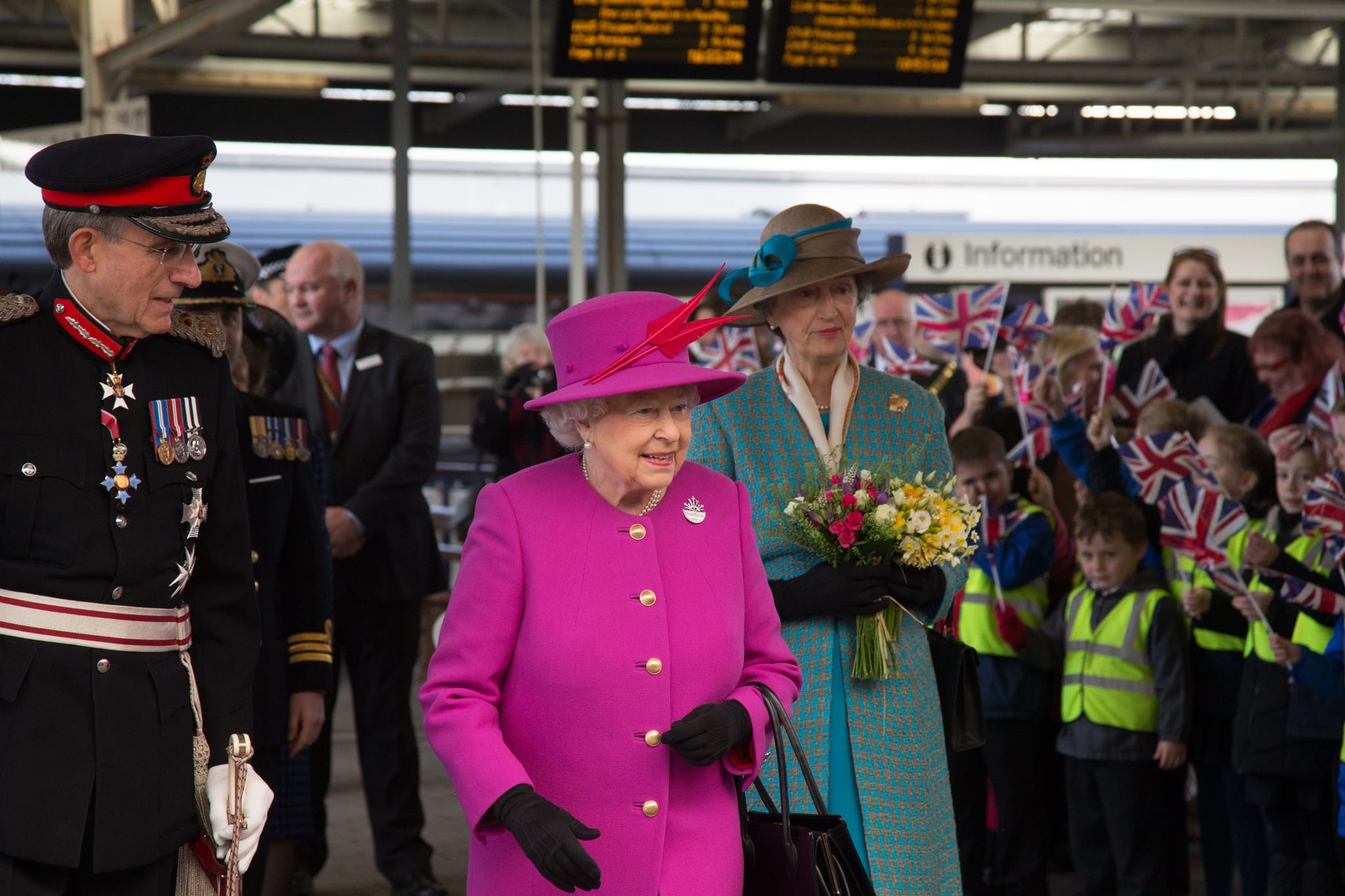 PLYMOUTH, ENGLAND - MARCH 20:  Queen Elizabeth II walks from the platform as she arrives at Plymouth Railway Station as she visits the city on March 20, 2015 in Plymouth, England.  (Photo by Matt Cardy - WPA Pool/Getty Images)