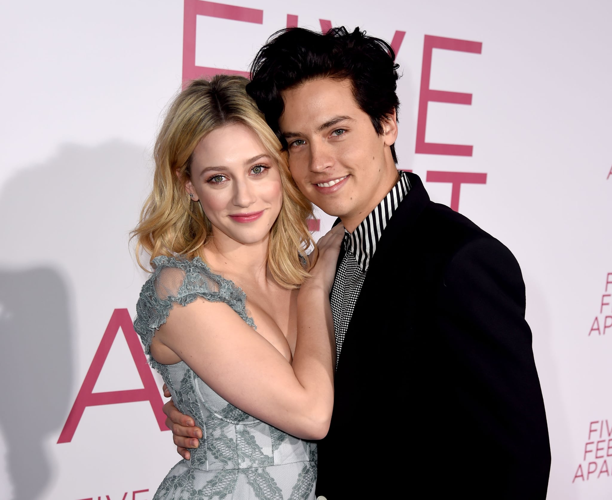 LOS ANGELES, CALIFORNIA - MARCH 07: Lili Reinhart (L) and Cole Sprouse arrive at the premiere of CBS Films