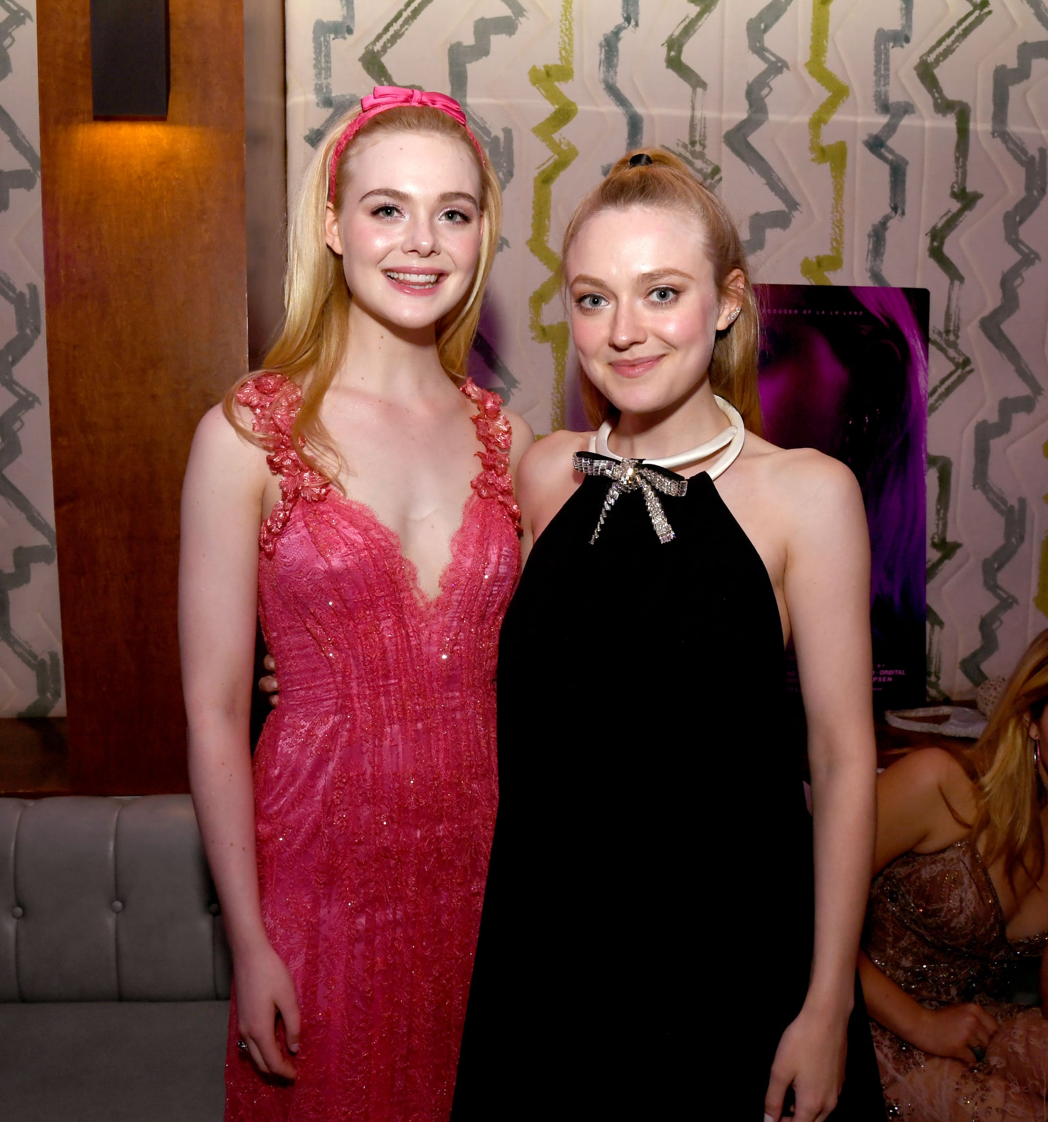 HOLLYWOOD, CALIFORNIA - APRIL 02: Elle Fanning (L) and Dakota Fanning pose at the after party for a special screening of Bleeker Street