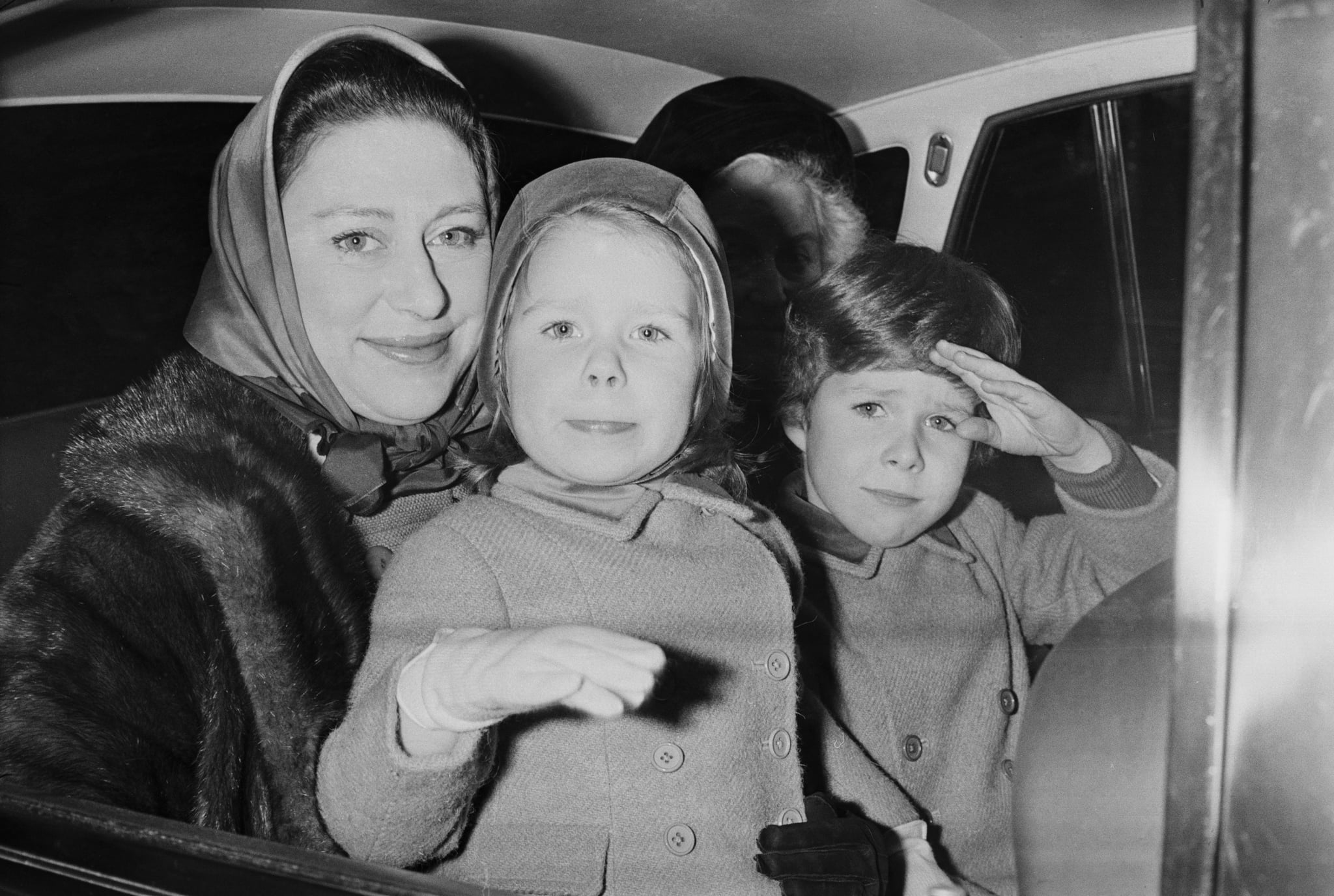 Princess Margaret, Countess of Snowdon (1930 - 2002) sits in the backseat of a car with her children David and Sarah and their nanny Mabel Anderson, London, UK, 23rd January 1968. (Photo by Terry Fincher/Daily Express/Getty Images)