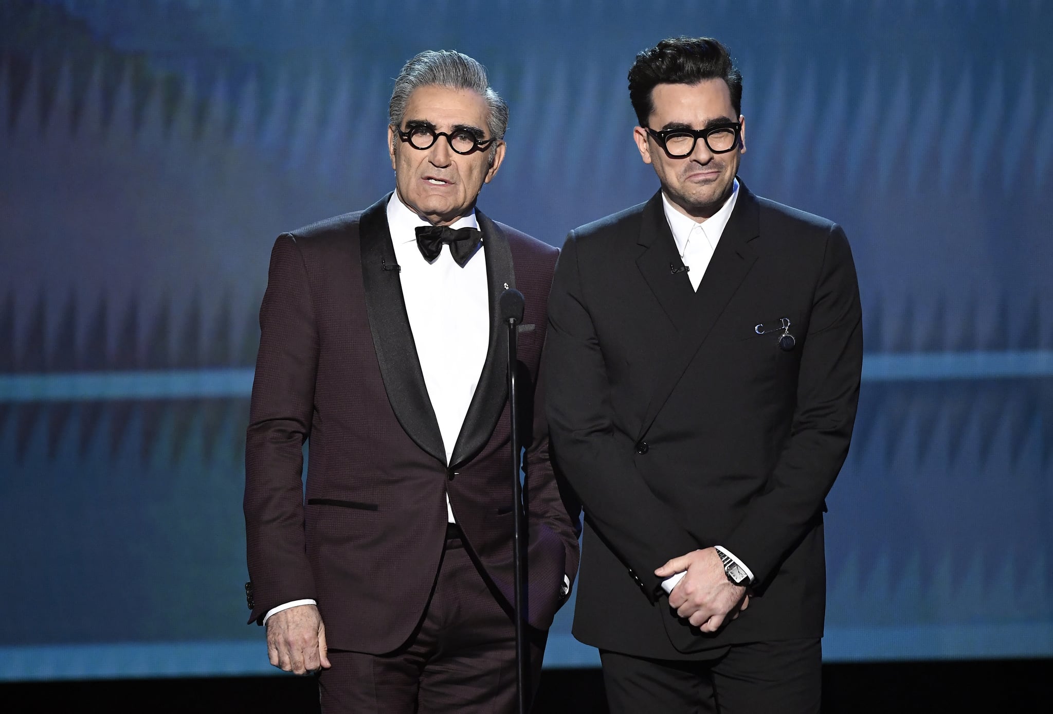 LOS ANGELES, CALIFORNIA - JANUARY 19: (L-R) Eugene Levy and  Dan Levy speak onstage at the 26th Annual Screen Actors Guild Awards at The Shrine Auditorium on January 19, 2020 in Los Angeles, California. 721359 (Photo by Kevork Djansezian/Getty Images for Turner)